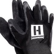 Hoonigan HBOX work gloves featuring a black and grey design, reinforced fingertips, and adjustable wrist straps for optimal fit and protection.