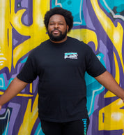 Black Hoonigan 86 TIRE SLAYERS short sleeve tee featuring a bold graphic design on the front.