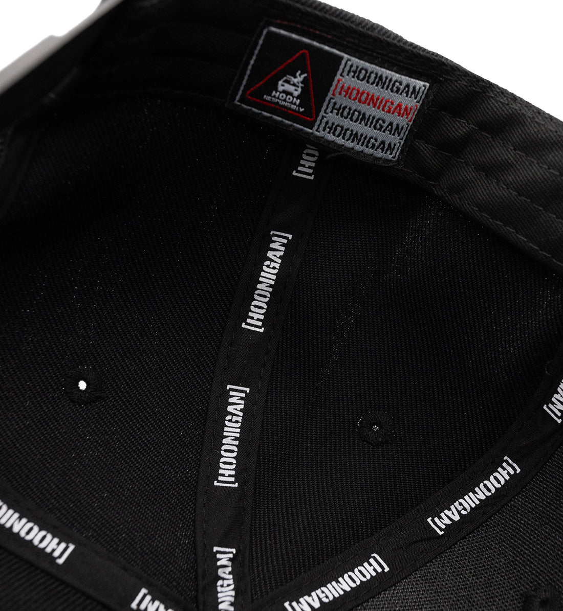 Black Hoonigan TIRE SLAYER Snapback Hat featuring bold white logo and graphics, adjustable snapback closure.