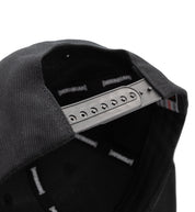 Hoonigan TIRE SLAYER Snapback Hat in black with white logo and adjustable strap.