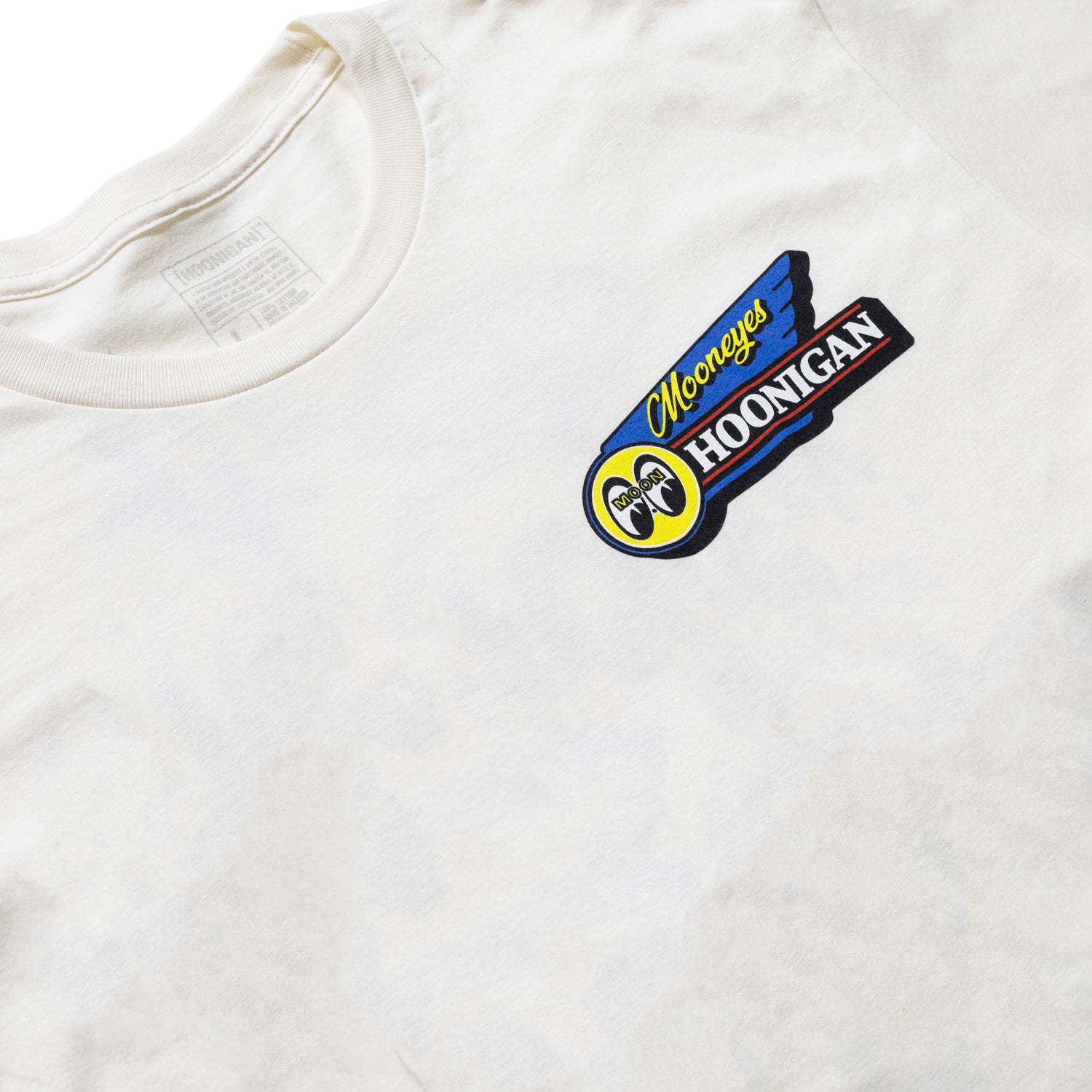 Hoonigan x Mooneyes MOONMOTEL Short Sleeve Tee in natural color, featuring a retro graphic design on the front.