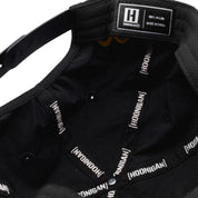 Hoonigan x Mooneyes decorated unstructured snapback hat featuring a graphic logo on the front and a black color scheme.