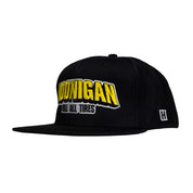 Hoonigan KING OF MONSTERS 6 Panel Snapback Hat featuring a black design with a colorful monster graphic and adjustable snapback closure.