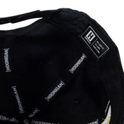 Hoonigan KING OF MONSTERS 6 Panel Snapback Hat in black with vibrant graphic detailing on the front.