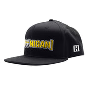 Hoonigan x Mooneyes MOON BAR snapback hat featuring a black base with yellow and white embroidered logos on the front.