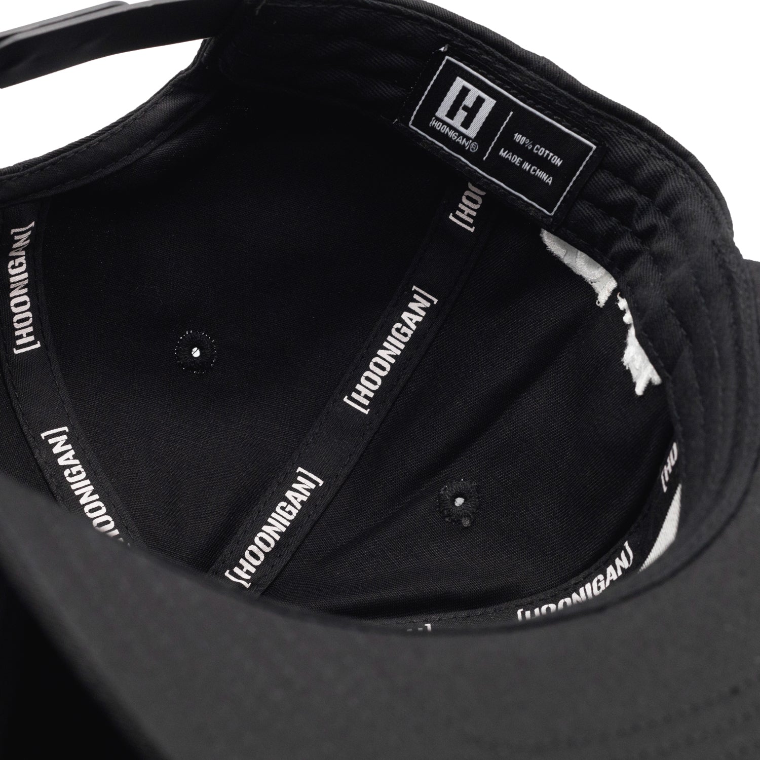 Hoonigan x Mooneyes MOON BAR Snapback Hat featuring a black body with white and yellow embroidered logos.