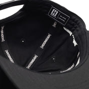 Hoonigan x Mooneyes MOON BAR Snapback Hat featuring a black body with white and yellow embroidered logos.