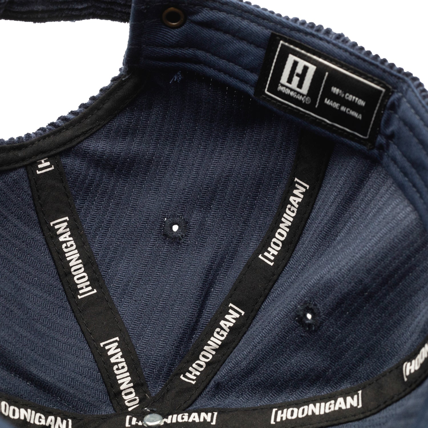 Hoonigan x Mooneyes MOONIGANS unstructured strapback hat featuring a black fabric, embroidered logo, and adjustable strap.