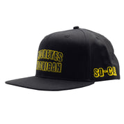 Hoonigan x Mooneyes SO CAL snapback hat featuring a black base, embroidered logo on the front, and a flat visor.