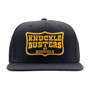 Hoonigan BELT SANDER Snapback Hat featuring a black cap with a bold graphic logo and adjustable strap.
