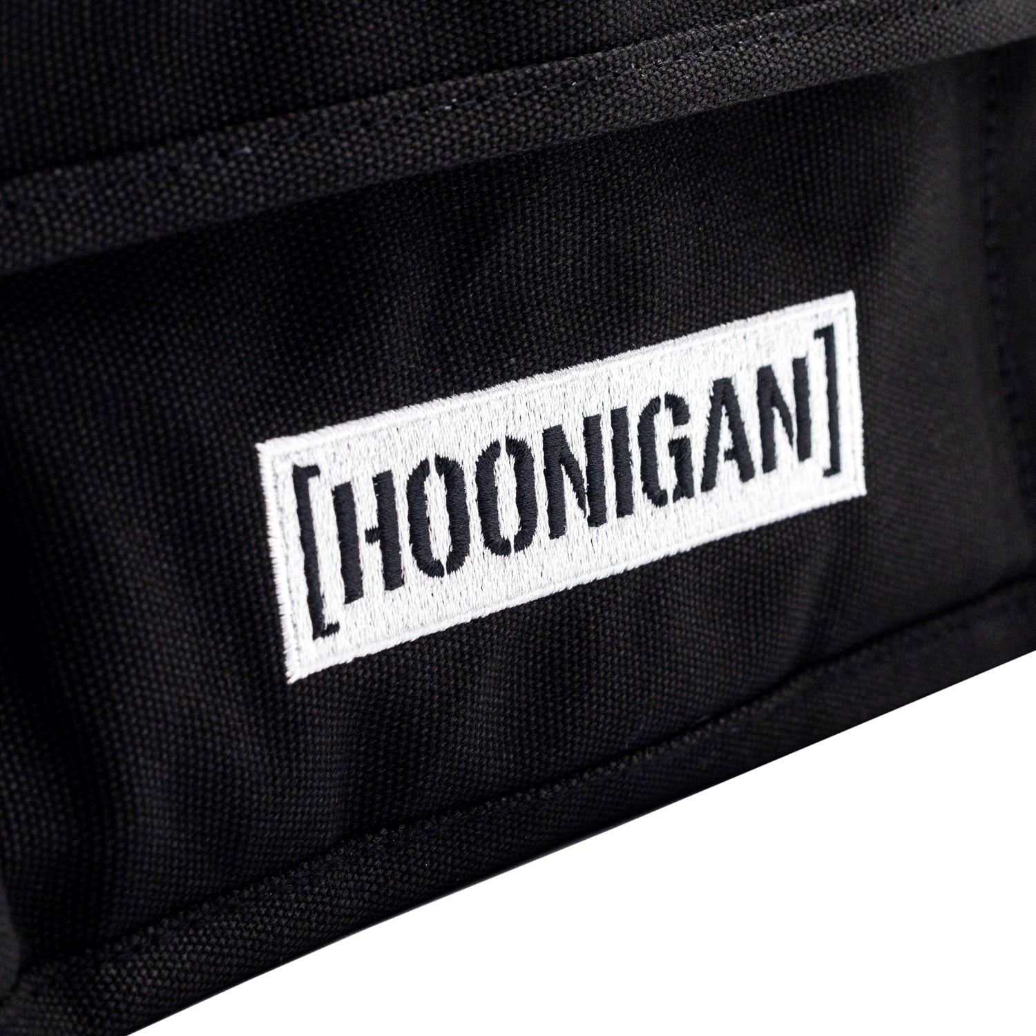Hoonigan CENSOR BAR Tool Bag featuring a durable design, multiple compartments, and a bold logo, ideal for automotive enthusiasts and mechanics.