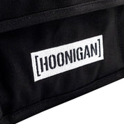 Hoonigan CENSOR BAR Tool Bag featuring a durable design, multiple compartments, and a bold logo, ideal for automotive enthusiasts and mechanics.