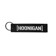 Hoonigan CENSOR BAR Jet Tag Keychain featuring a black and white design with a bold "CENSOR" print and a durable metal clip.