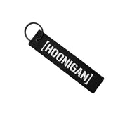 Hoonigan CENSOR BAR Jet Tag Keychain featuring a black fabric design with bold white text and a metal keyring attachment.