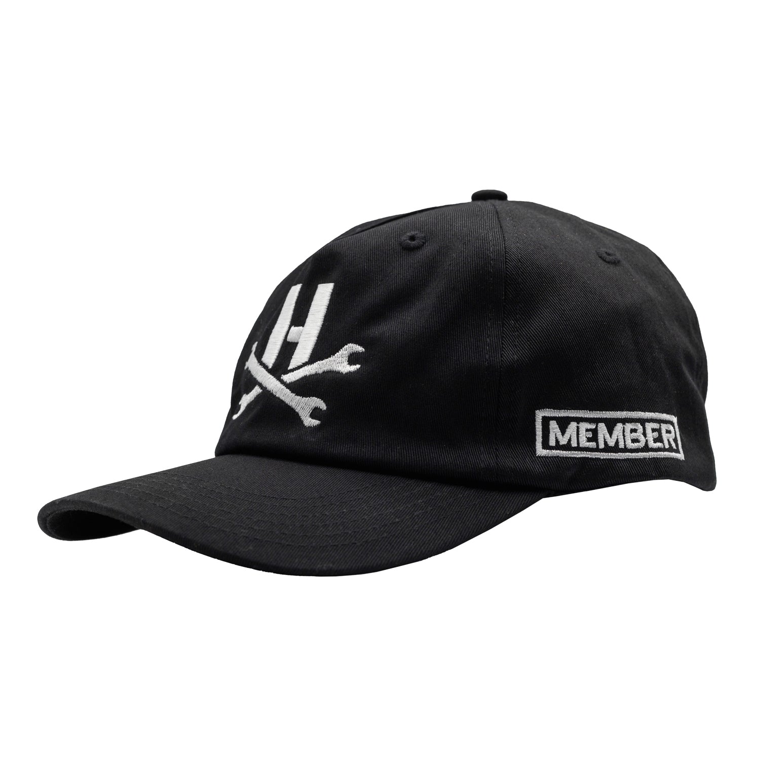 Hoonigan MAYHEM Unstructured Strapback Hat in black with white logo, featuring a relaxed fit and adjustable strap.