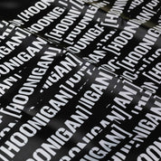 Hoonigan SCATTER PRINT Fender Cover featuring a colorful, graffiti-style design, ideal for car enthusiasts.