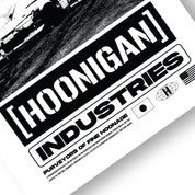 Hoonigan x Sayaka BOMB GIRL Poster featuring a vibrant design, 16"x20" size, showcasing a dynamic female character in a colorful, action-packed illustration.