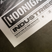 Hoonigan x Sayaka BOMB GIRL Poster featuring a dynamic graphic design, 16"x20" size, showcasing bold colors and automotive-themed artwork.