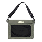 Hoonigan H.A.V.O.C. rain-activated windbreaker jacket with a black adjustable strap and front zip pocket, designed for weather protection.