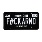 Black license plate with white text reading "FCK ARND" and "and find out," featuring "Hoonigan" branding and decorative elements.