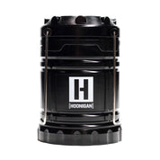Black Hoonigan H.A.V.O.C. lantern with a white logo, metal handle, and rugged design, ideal for outdoor or automotive use.