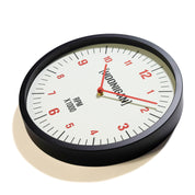 Hoonigan RPM Glow Clock featuring a minimalist design with red markings and hands on a white face, ideal for car enthusiasts.