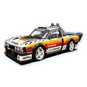 Hoonigan GYMKHANA AUSSIE SHRED BRAT sticker featuring a stylized Subaru truck with vibrant graphics and racing details.
