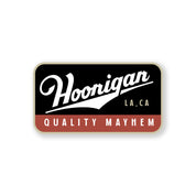 Hoonigan Champagne sticker featuring bold text and a vintage design, emphasizing quality and automotive culture.