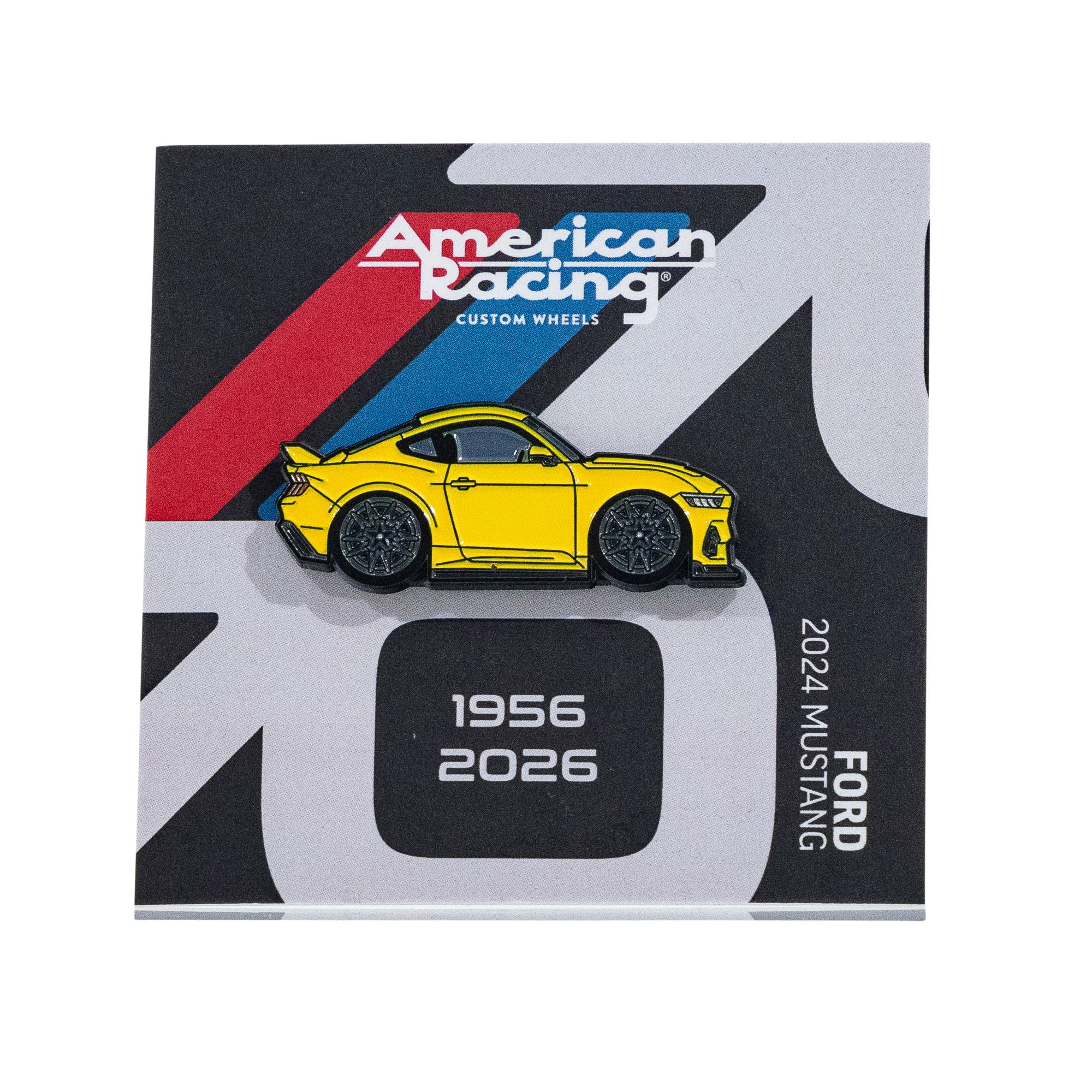 Yellow Ford Mustang collectible pin by American Racing, featuring a sleek design and commemorating 1956 to 2026.