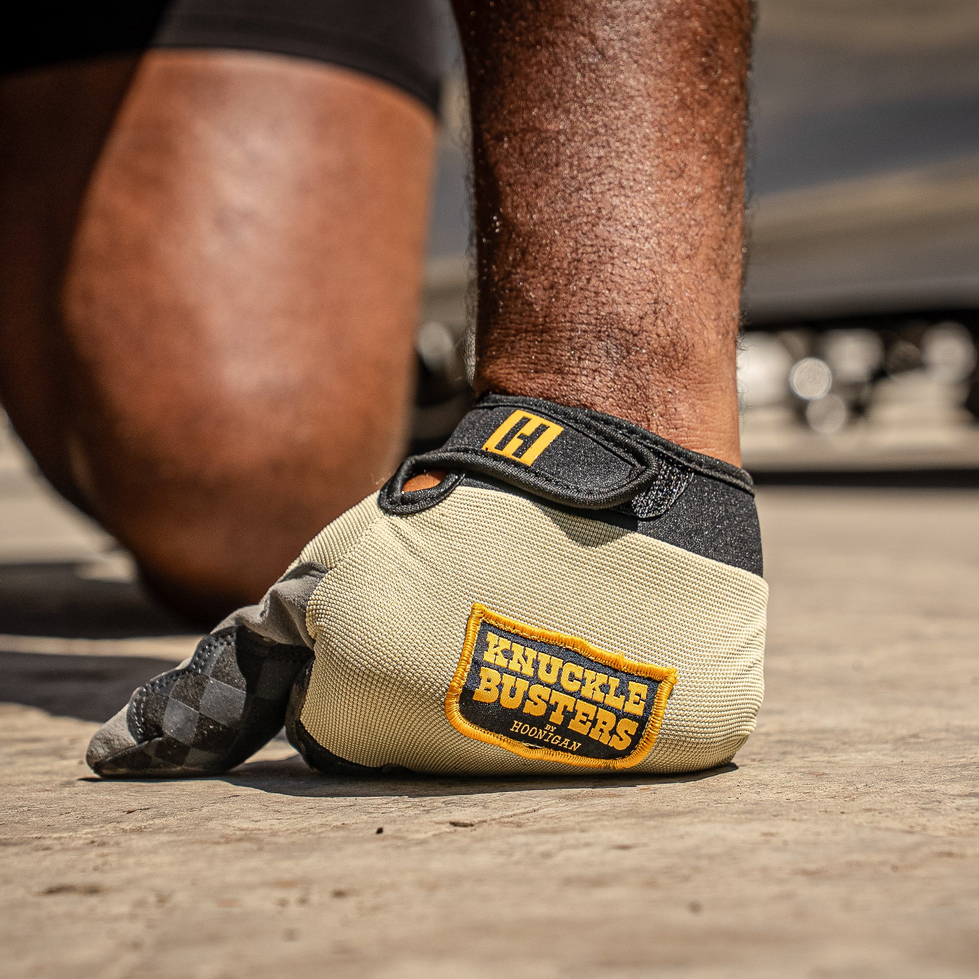 Hoonigan Knucklebusters gloves feature a durable design with a bold logo, ideal for motorsport enthusiasts and aggressive driving.