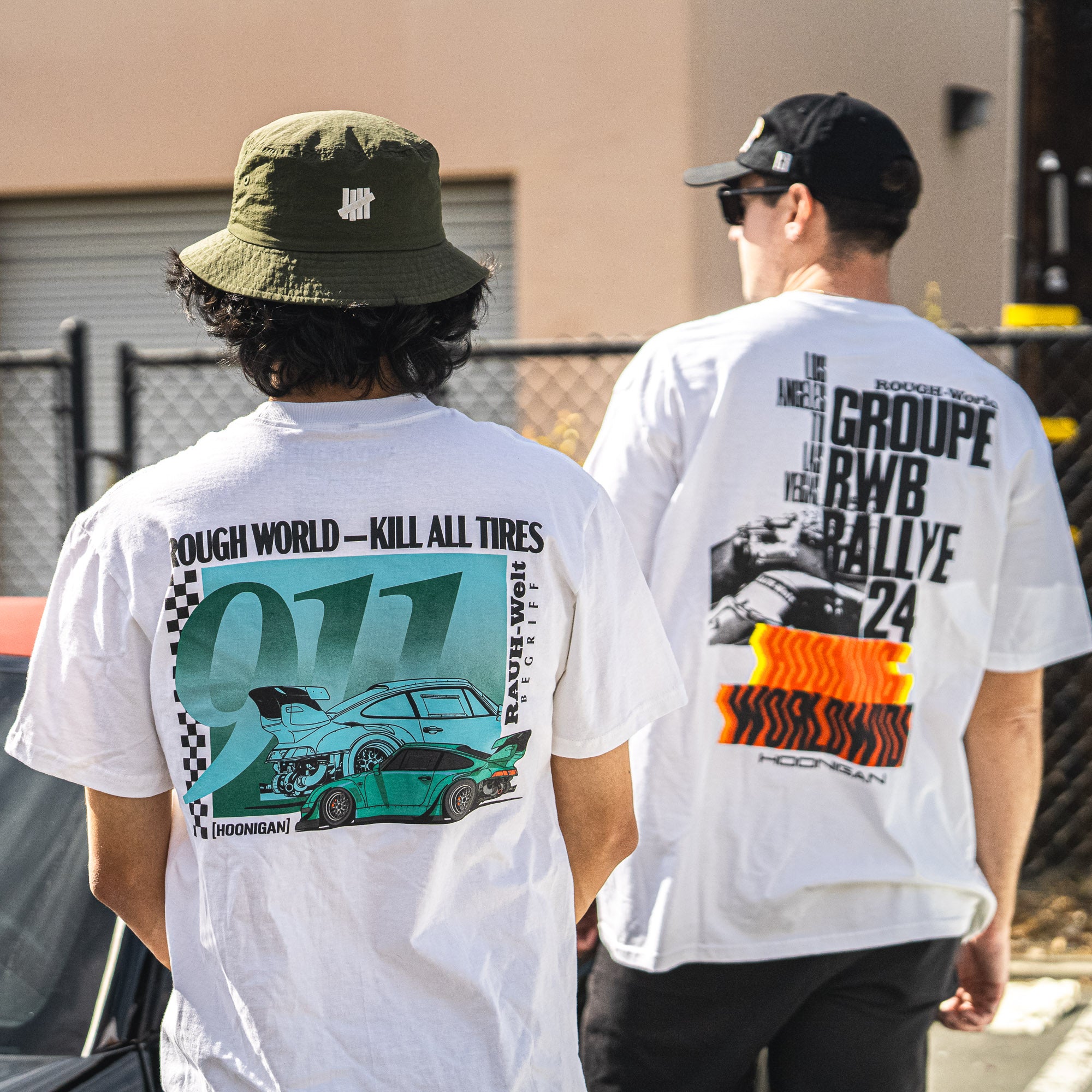 Hoonigan X RWB Rough World Kill All Tires Short Sleeve Tee featuring bold graphics on a black cotton fabric.