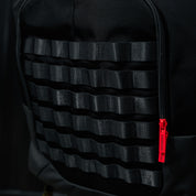 Hoonigan RATCHET STRAP Backpack featuring a durable design with adjustable straps and bold branding, ideal for outdoor activities and everyday use.