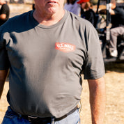 US Mags DESPERADO Short Sleeve Tee featuring a bold graphic design on a black background.