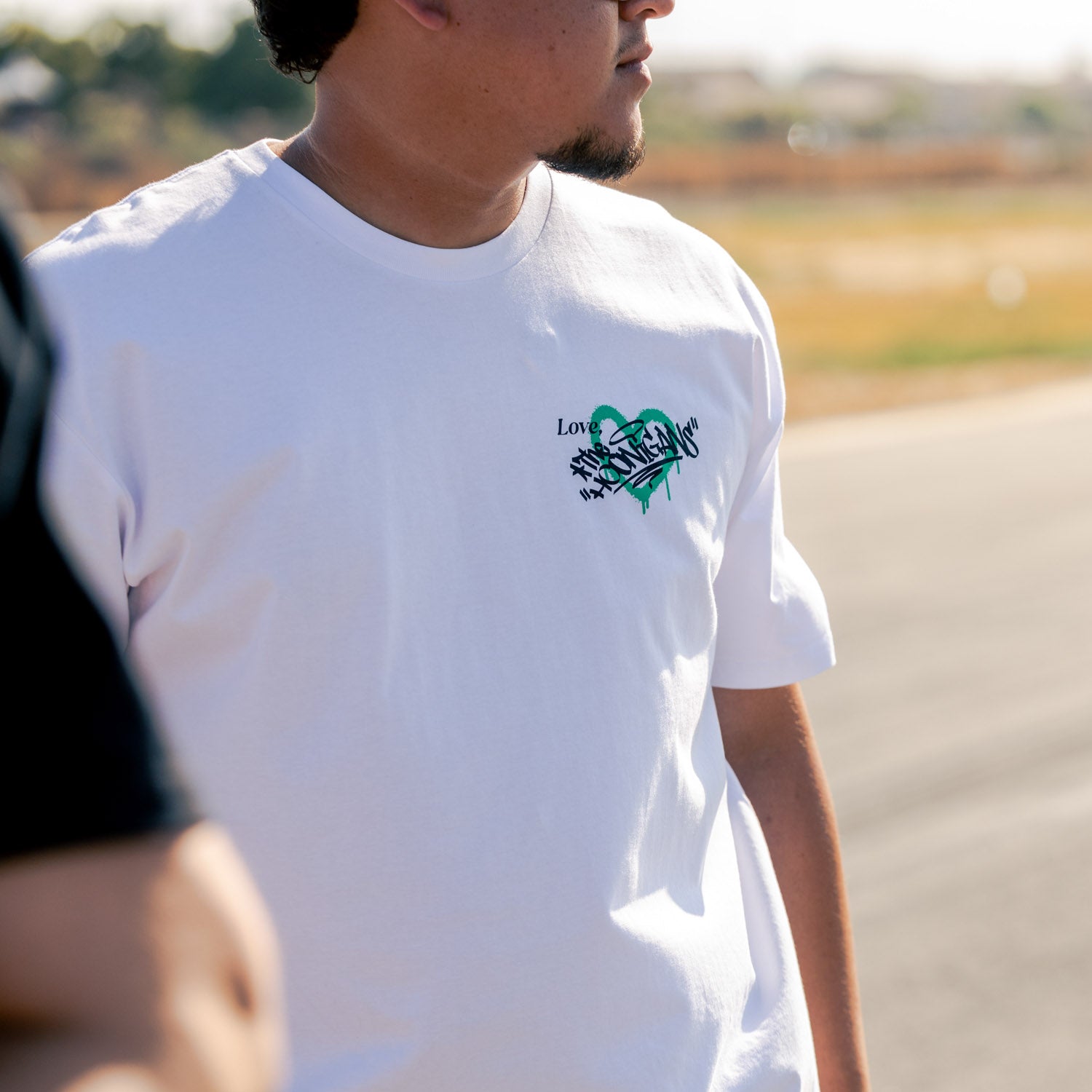 Hoonigan FIND OUT 2.0 Short Sleeve Tee in black featuring bold white logo text on the front.