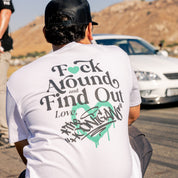 Hoonigan FIND OUT 2.0 Short Sleeve Tee in black with bold white graphics featuring the Hoonigan logo.