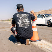 Hoonigan RESPECT YOUR ELDERS Short Sleeve Tee featuring bold black lettering on a white background, showcasing a casual and stylish design.
