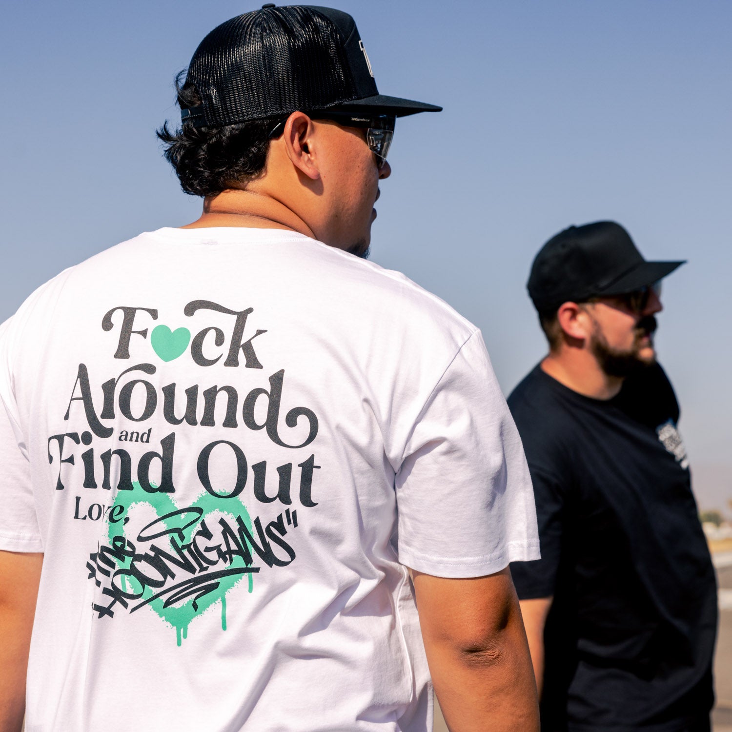 Hoonigan FIND OUT 2.0 Short Sleeve Tee in black, featuring bold white graphic design on the front.