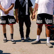 Hoonigan SURGEON GENERAL Nylon Shorts in black featuring a graphic logo and adjustable waistband.