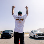 American Racing CHECKERS Short Sleeve Tee featuring a bold checkered graphic on the front, displayed on a light background.