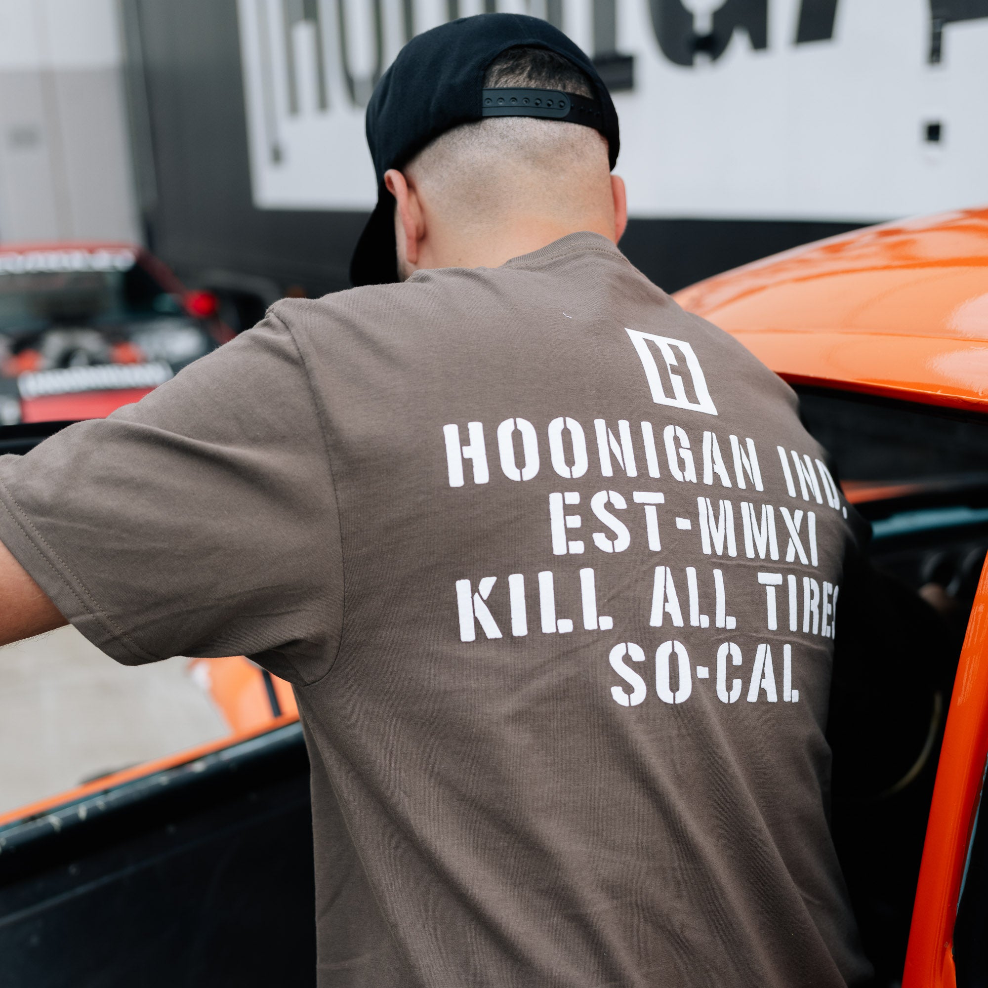 Black Hoonigan STENCIL Short Sleeve Tee featuring bold white logo graphic on the front, displayed on a plain background.