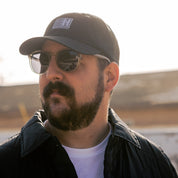 Hoonigan Motorsports VICTOR Quilted Jacket in black with logo on chest, featuring a stylish quilted design and front zip closure.