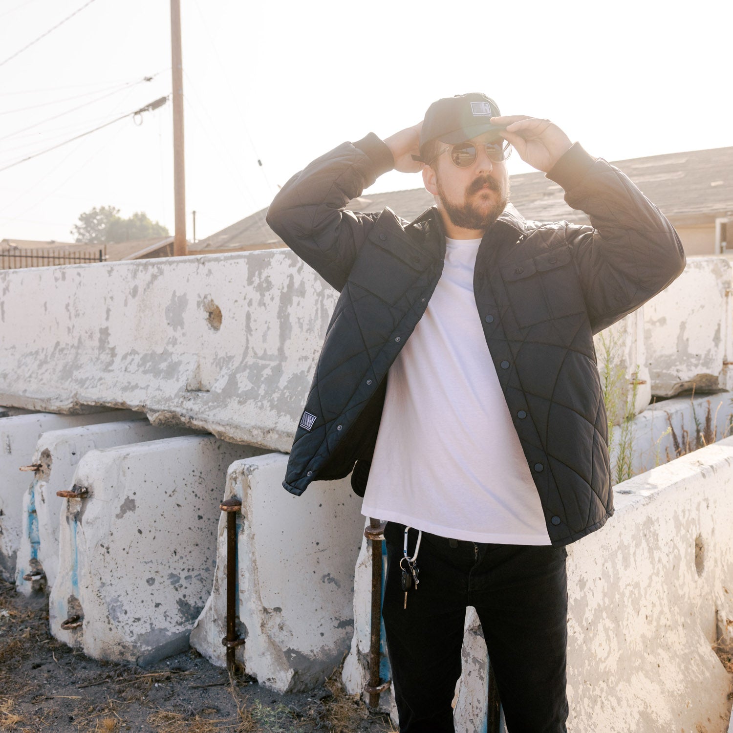 Hoonigan Motorsports VICTOR Quilted Jacket in black with a logo on the chest and stylish quilted design.