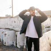 Hoonigan Motorsports VICTOR Quilted Jacket in black with a logo on the chest and stylish quilted design.