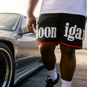 Hoonigan SURGEON GENERAL nylon shorts in black, featuring a bold logo and adjustable drawstring.