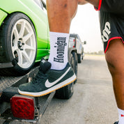 Hoonigan BURNOUT TEAM socks featuring a bold graphic design, ideal for motorsport enthusiasts and casual wear.