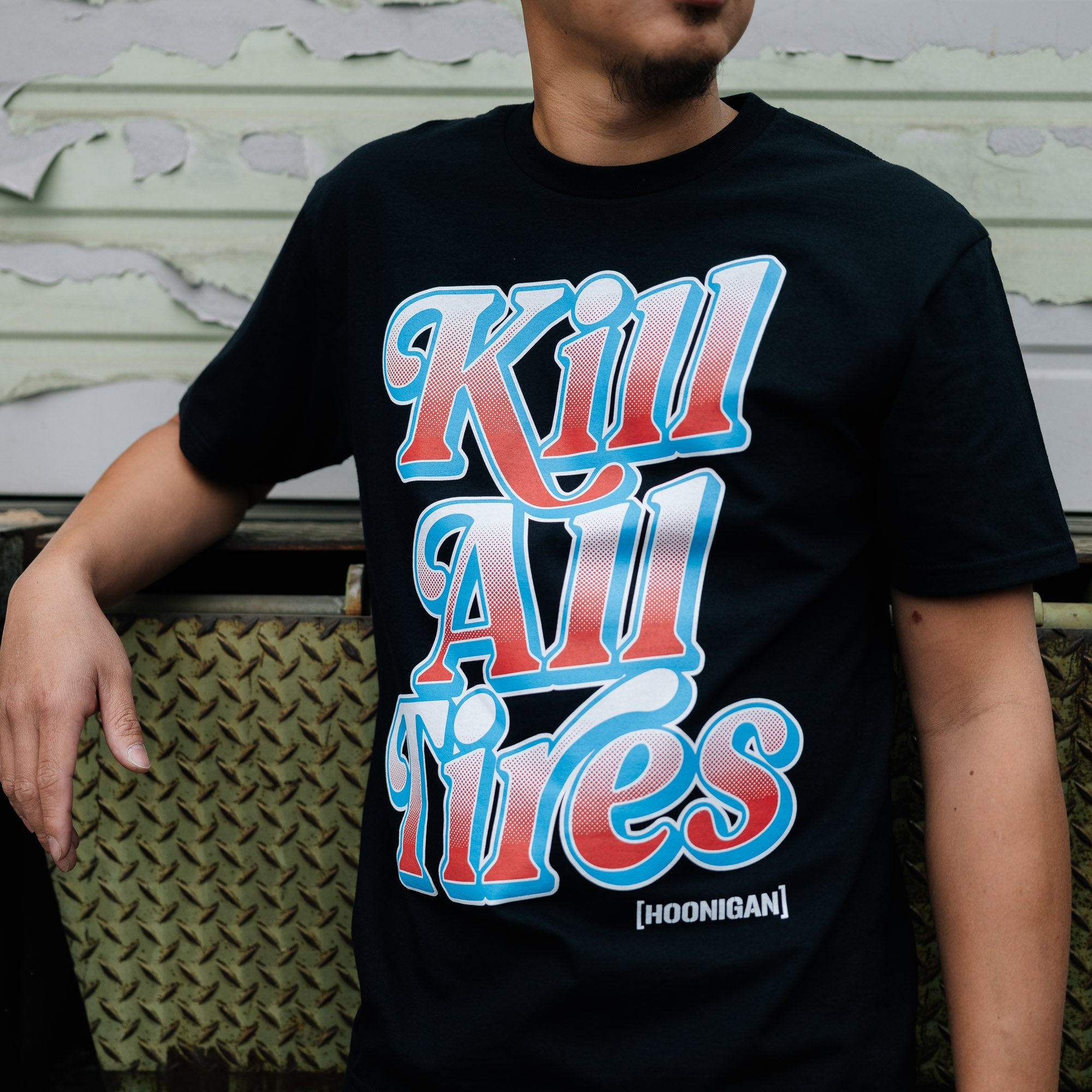 Hoonigan KILL ALL TIRES V2 Short Sleeve Tee featuring a bold graphic design on a black background.