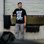 Black short sleeve tee featuring "KILL ALL TIRES V2" graphic in bold white letters, designed by Hoonigan.