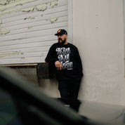 Hoonigan KILL ALL TIRES V2 Long Sleeve Tee featuring bold graphic print on the front, black fabric, and relaxed fit.