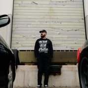 Hoonigan KILL ALL TIRES V2 Long Sleeve Tee featuring bold graphic design on black fabric, ideal for motorsport enthusiasts.