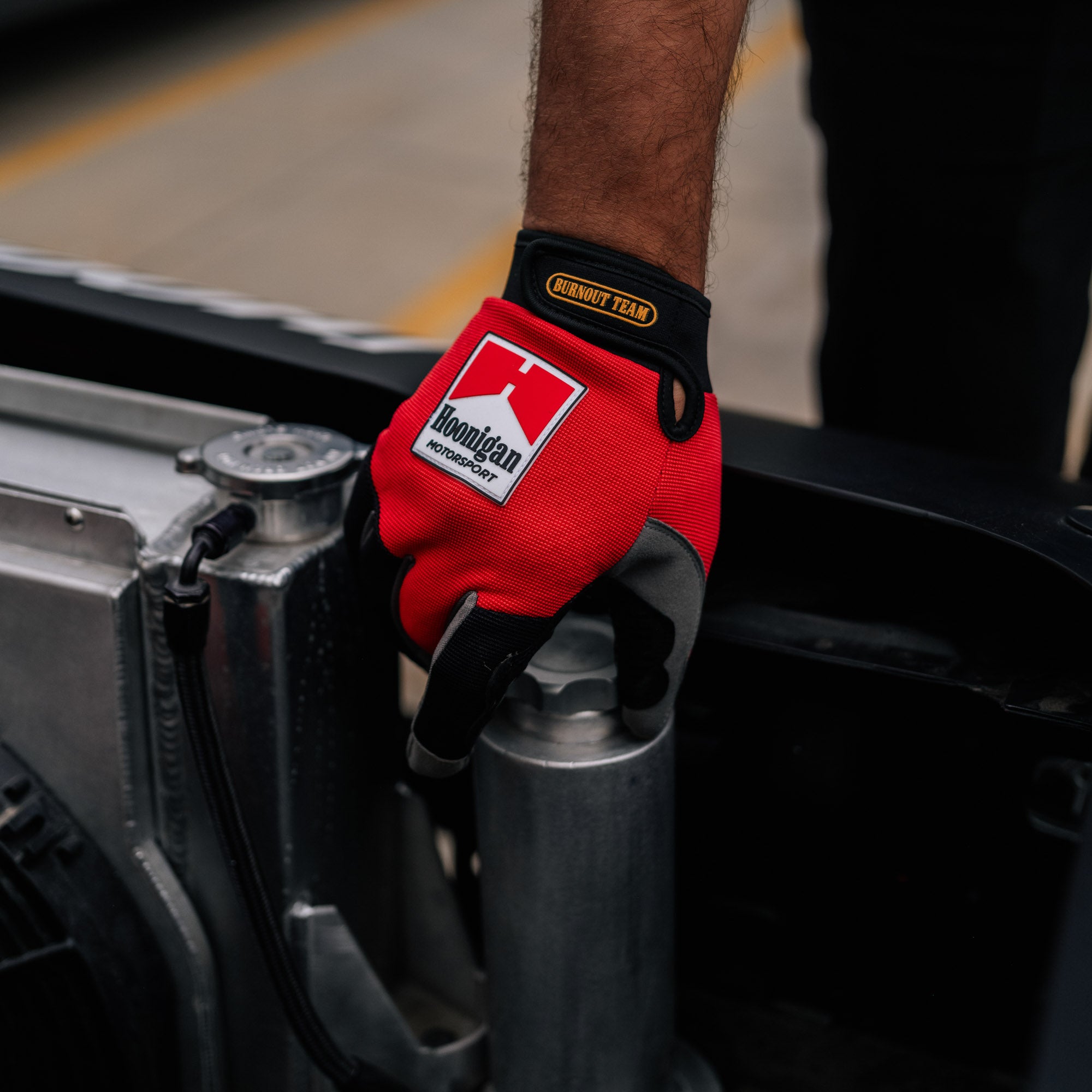 Hoonigan Surgeon General gloves featuring a stylish design and logo, suitable for automotive and motorsport enthusiasts.